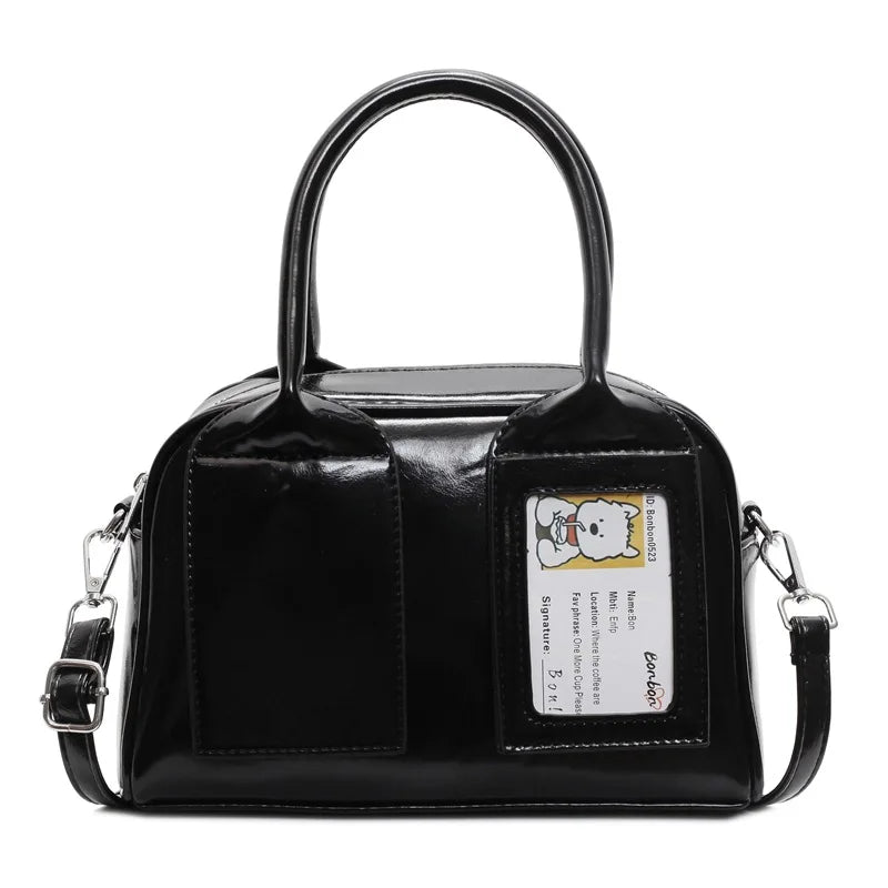 2026 New Y2K Harajuku Shoulder Bag Women in shiny black PU with handle and adjustable strap.