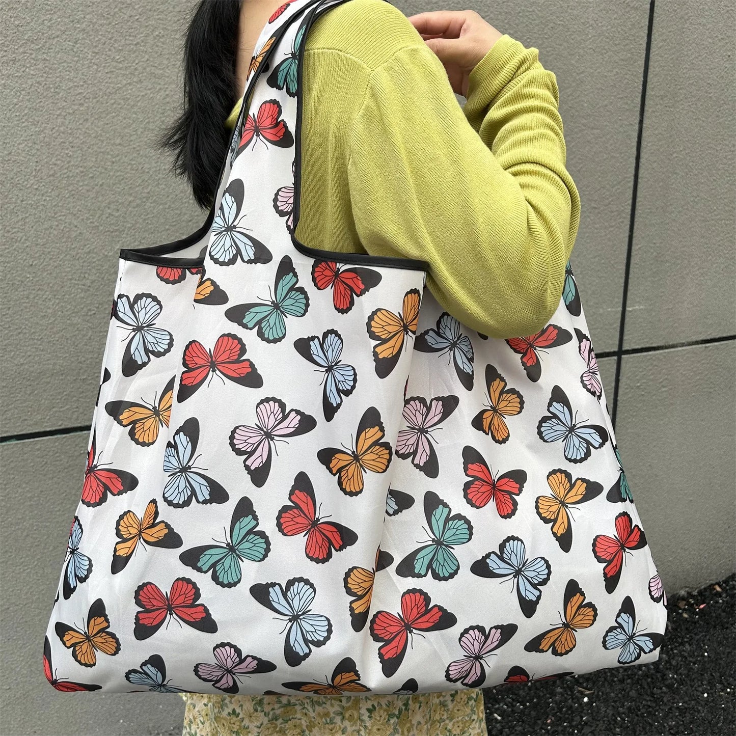 Large Foldable Shopping Bag New Fashion featuring a floral butterfly pattern, perfect for stylish shopping.