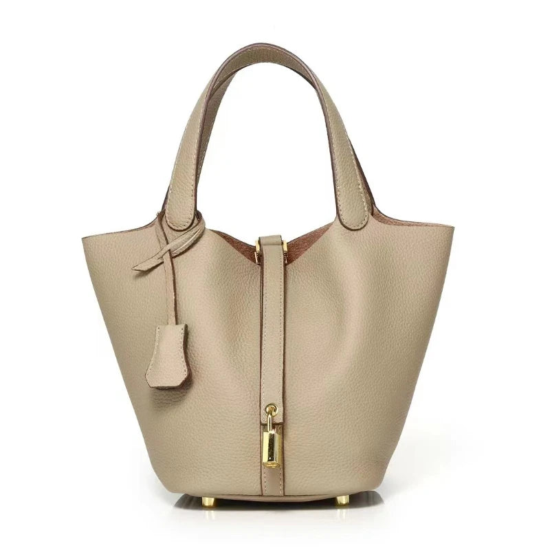 New Leather Luxury Handbag, High-end in soft beige with zipper closure and sturdy handles, perfect for stylish women.