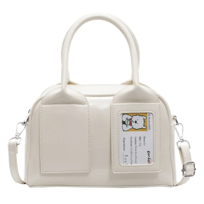 2026 New Y2K Harajuku Shoulder Bag Women in white patent leather with dual handles and removable strap.
